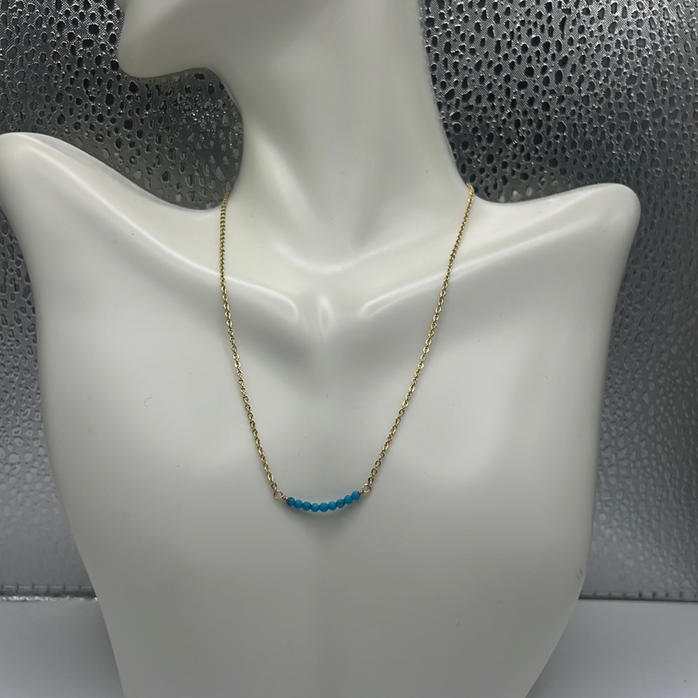 14kt Gold GF torquoise sleepimg beaty 7 bead lucky necklace.